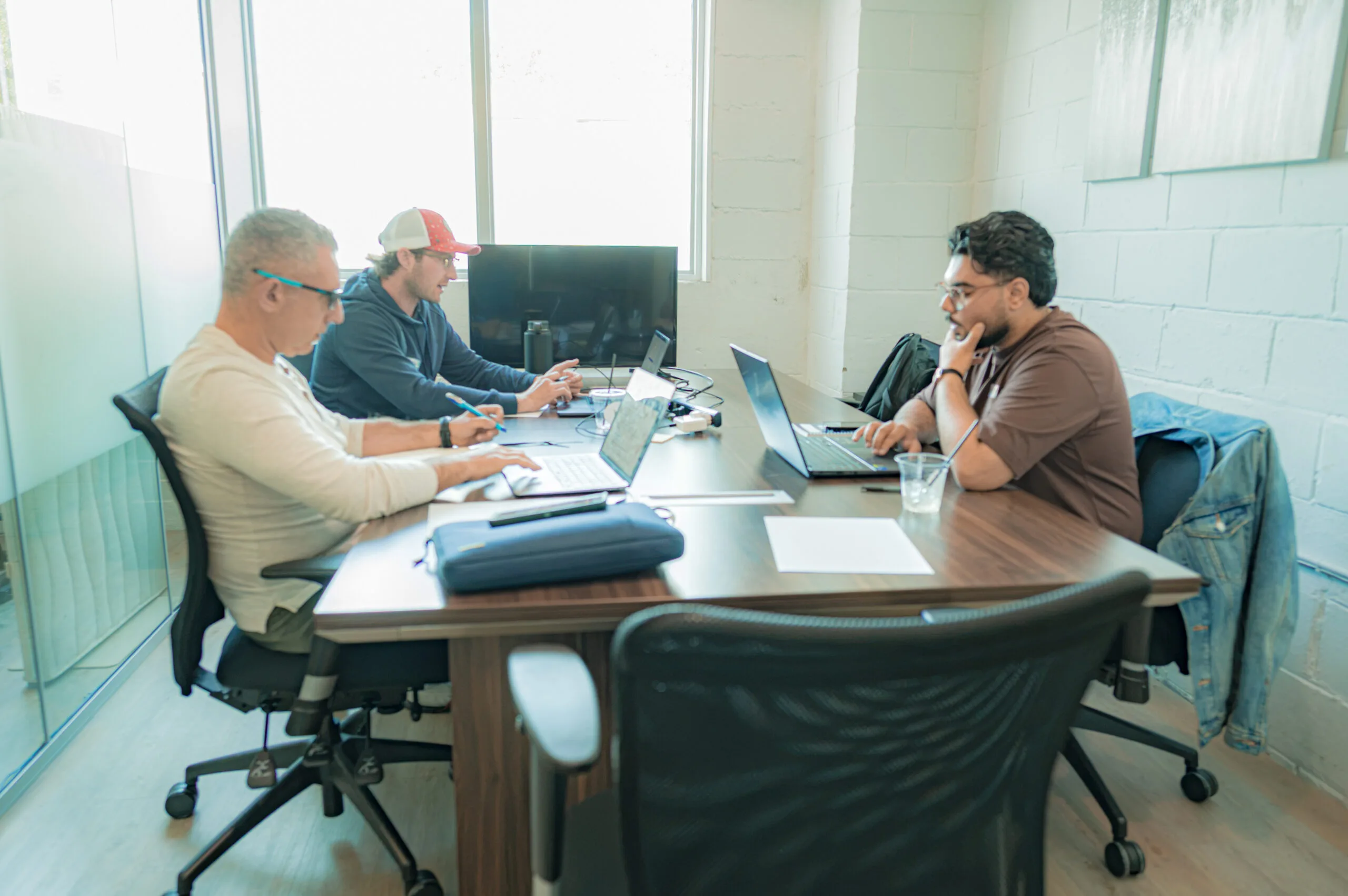 People working together around a table.